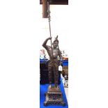 A large cast metal figure of a Knight, 62cm high Condition Report: In good vintage condition.