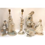 A Lladro figure of girl kneeling with a basket of flowers, 26cm high, a Lladro table lamp with a