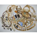 A bag full of vintage costume jewellery to include, Monet, Vanderbilt, Czech glass beads Condition