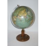 A terrestrial globe on stand, approximately 36cm diameter Condition Report: Available upon request