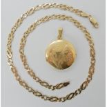 An 18ct gold round locket diameter 2.7cm,weight 9.4gms, 9ct gold fancy chain length 41cm, weight