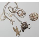 A silver Ola Gorie mythical beast pendant, silver eagle brooch and a bracelet, a Shetland silver