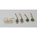A pair of 9ct emerald flower cluster earrings flower diameter 8mm approx, continental hoop fittings,