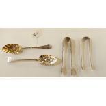 A lot comprising two silver berry spoons, London 1815 and 1785 and two pairs of sugar tongs (