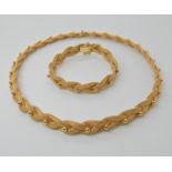 An Italian made 18ct woven gold necklace and bracelet set with ball detail, length of bracelet 19cm,
