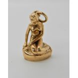 A 14ct gold charm of Copenhagen's Little Mermaid sculpture. Stamped BH for Danish goldsmith Bernhard