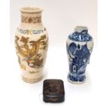 A Japanese Satsuma vase, decorated with a phoenix and mons, 18.5cm high, a small Chinese blue and
