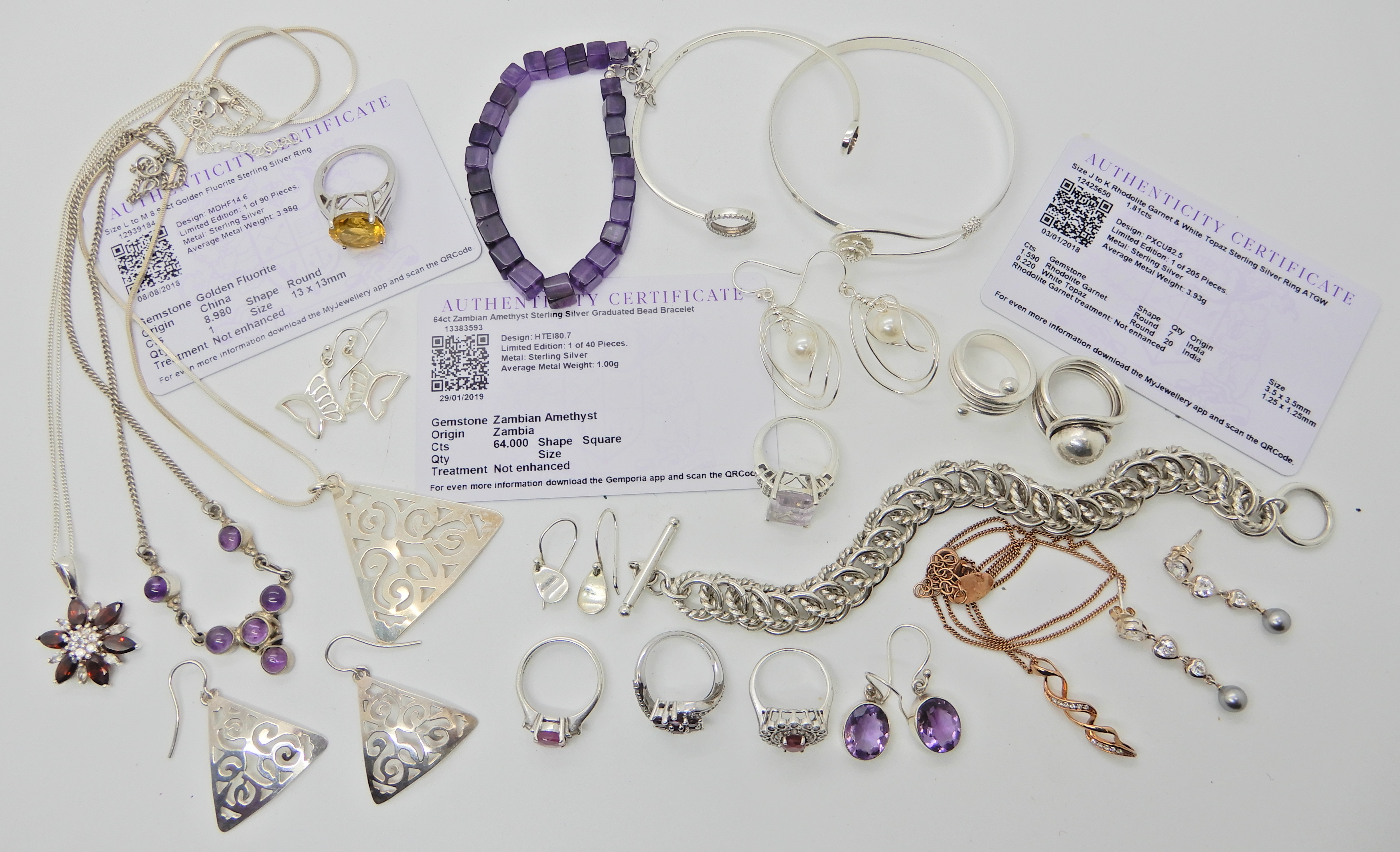 A collection of silver gem set jewellery to include amethyst items, with three Gemporia certificates