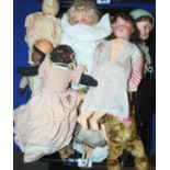 A collection of various bisque-headed dolls, Teddy bears etc Condition Report: Available upon