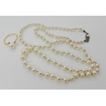 A string of Mikimoto pearls with a silver Mikimoto stamped clasp, length 58cm, together with a