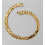 A bright yellow metal bracelet stamped 916 (22ct) length 19cm, weight 14.1gms Condition Report:
