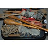 A tray lot including vintage roller skates, clubs and various books Condition Report: Available upon