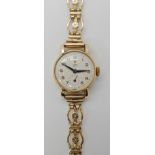 A 9ct gold Tudor Royal wristwatch, length 18cm, weight including mechanism 15.3gms Condition Report: