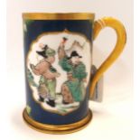 A continental mug in the Chinese taste, with gilt metal rims, 12cm high Condition Report: