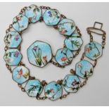 An Oriental copper and cloisonne enamel belt, enamelled with fish, flowers and plants, length 62cm