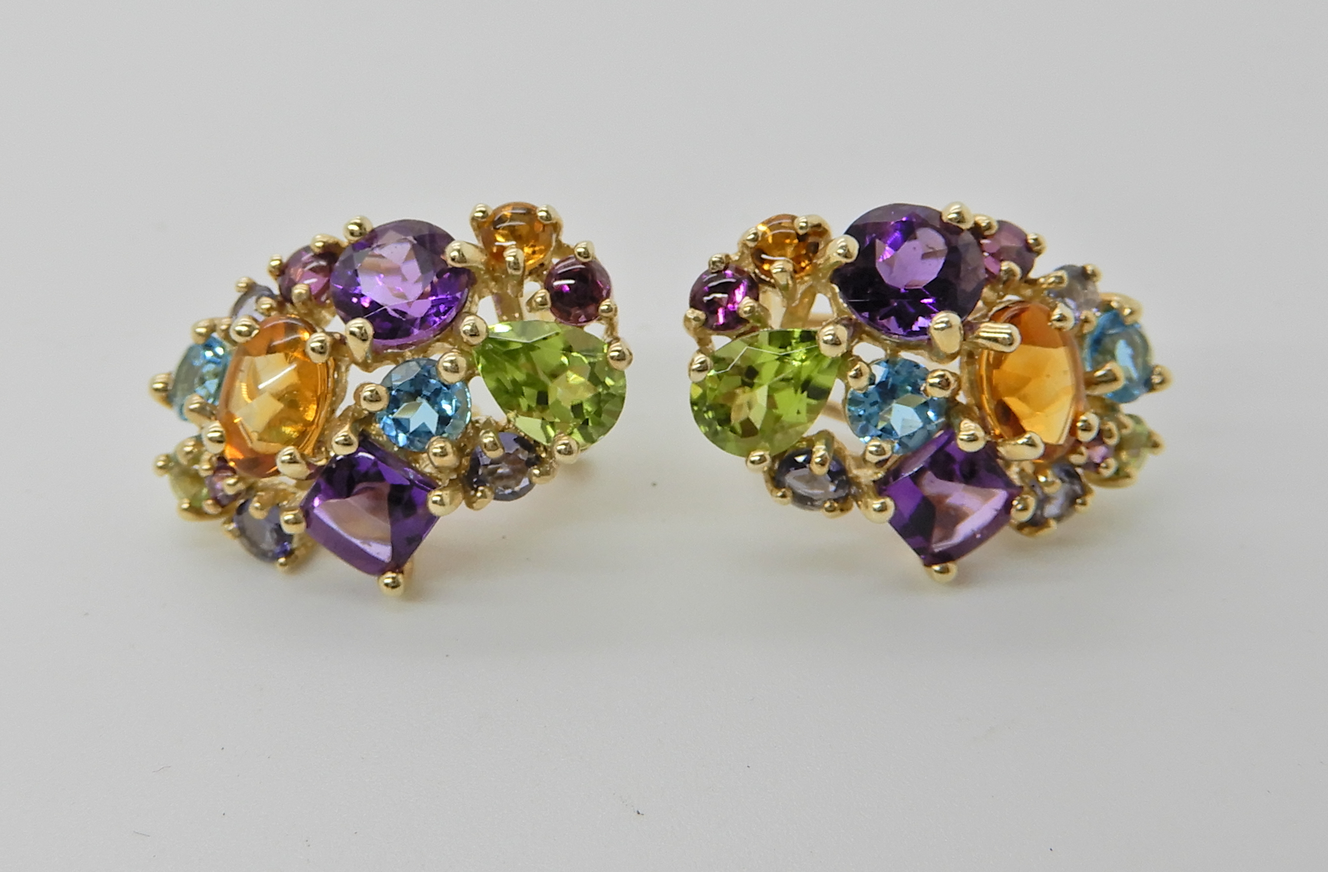 A pair of 9ct gold mixed gemstone cluster earrings, length 2.2cm x 1.5cm weight 7.3gms Condition