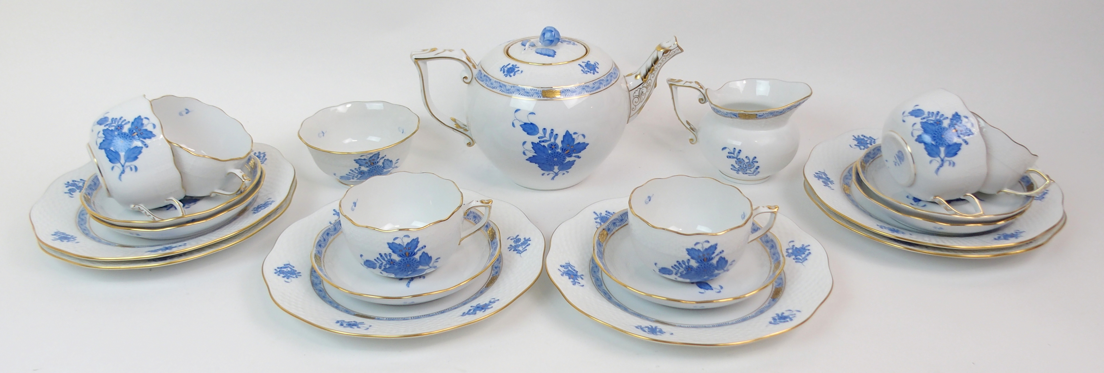 A HEREND CHINESE BOUQUET BLUE PATTERN TEASET comprising teapot, six cups, saucers, plates, milk