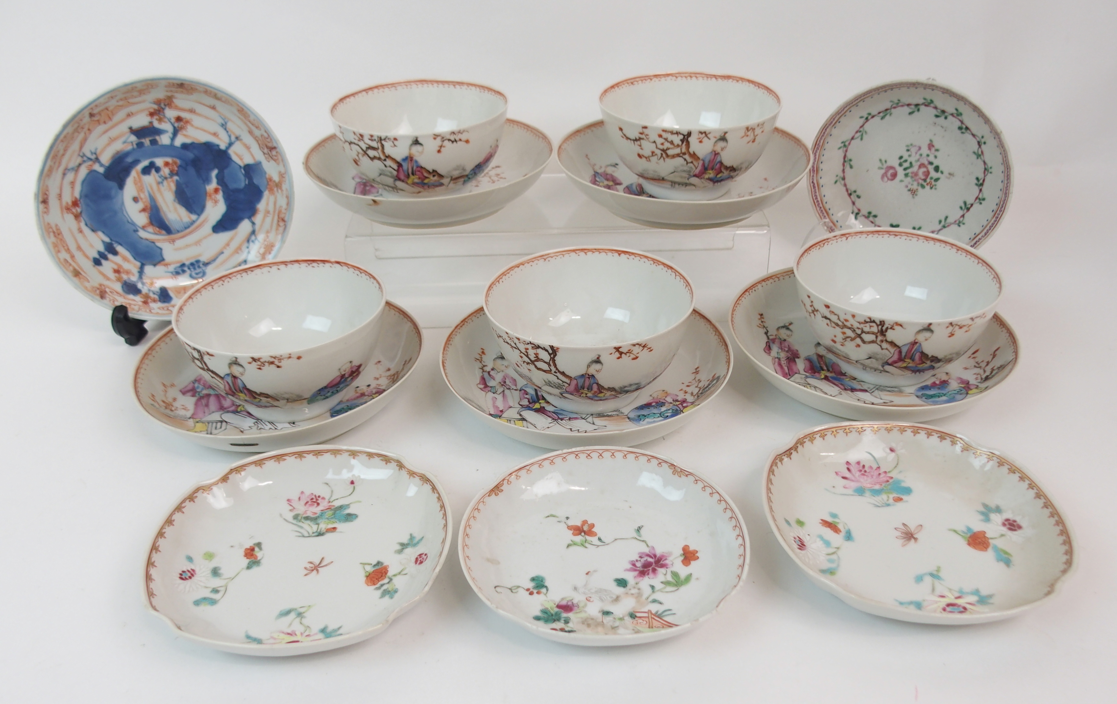 FIVE CHINESE EXPORT RICE BOWLS AND SAUCERS painted with ladies and children in garden landscapes (