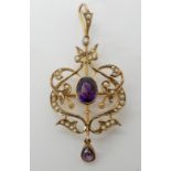 A 9ct gold amethyst and pearl Edwardian pendant brooch, length 5.8cm, weight 4.9gms Condition