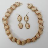 A 9ct gold cameo necklace, length 35.5cm, with matching drop earrings combined weight 34.4gms