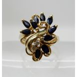A 9ct gold sapphire and diamond cluster ring, size N, weight 3.7gms Condition Report: Available upon