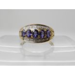 A 9ct tanzanite and diamond ring, size P1/2, weight 2.2gms Condition Report: Available upon request