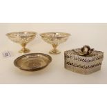 A lot comprising a pair of silver bon bon dishes, Sheffield 1914, a coin set silver dish, marked 800