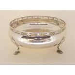 A silver bowl by Docker & Burn Limited, Birmingham 1924, of circular squat bulbous form with pierced