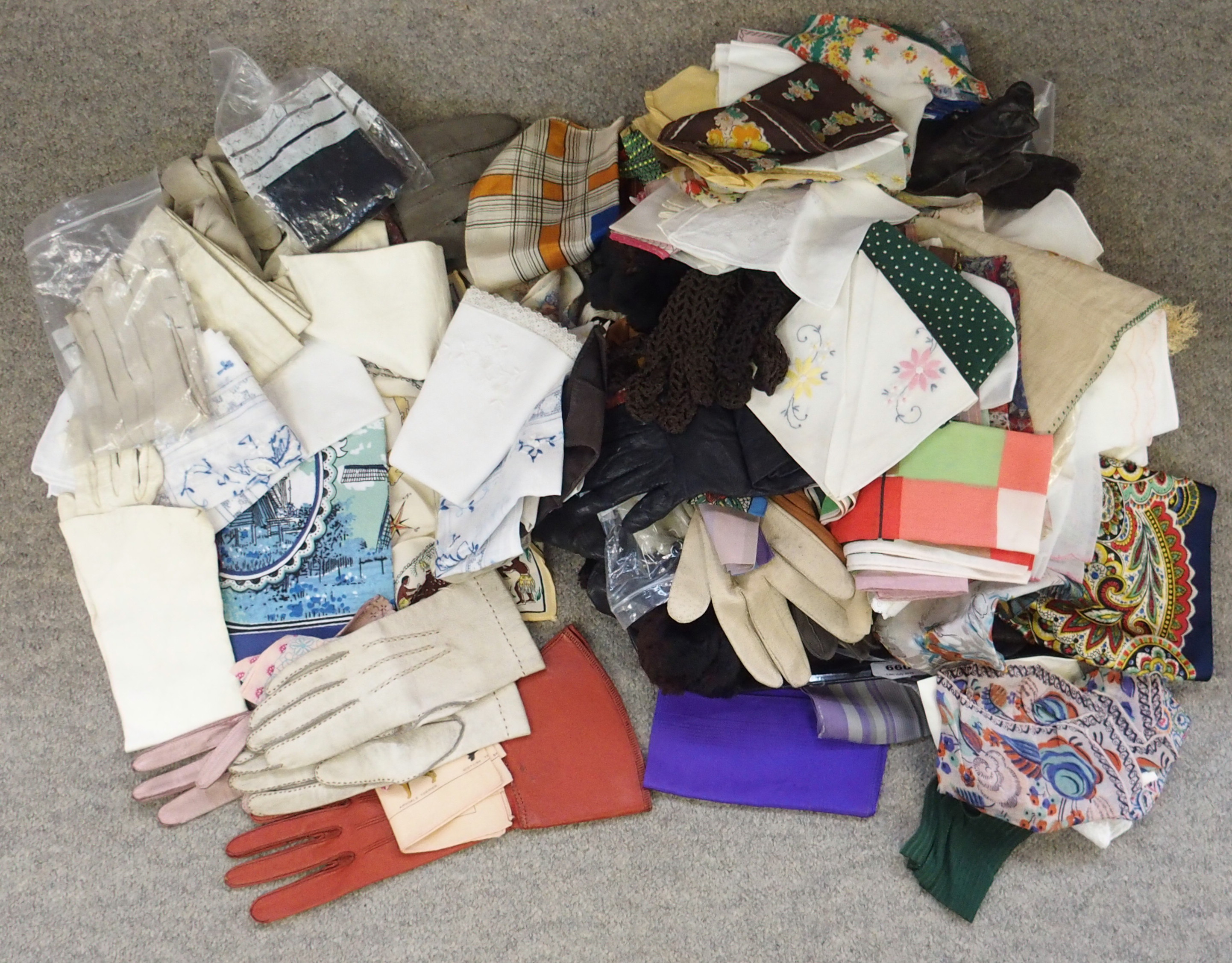 A collection of vintage ladies gloves, handkerchiefs etc Condition Report: Available upon request