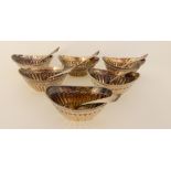 A cased set of six silver salts by Walker and John Barnard, London 1881, boat shaped with 3/4 ribbed