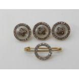 Three yellow and white metal buttons/shirt studs with mother of pearl and set with rose cut