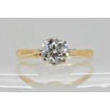 An 18ct old cut diamond solitaire ring, the old cut diamond is estimated approx at 0.70cts, in