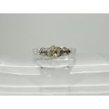 A 9ct white gold old cut diamond set ring set with estimated approx 0.66cts of diamonds, size L1/