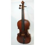 An early two-piece back violin with interior Antonius Stradivarius Made in Germany label, 35cm