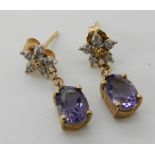 A pair of 9ct gold amethyst and diamond flower drop earrings, length 2cm, weight 1.5gms Condition