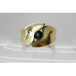 A 14ct gold sapphire and diamond ring, size P1/2 Condition Report: