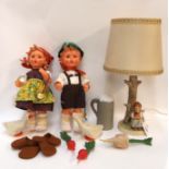 A Hummel 'Good Friends' table lamp, no. 228, 37cm high including shade, and two Hummel vinyl dolls