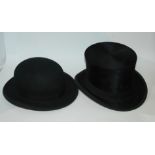 A black top hat and black bowler hat in cardboard cases and white scarf (3) Condition Report: