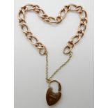 A 9ct gold curb link bracelet with heart shaped clasp, length 19.5cm approx, weight 12.3gms