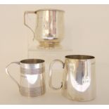 A silver christening mug, rubbed marks, of baluster shape with angular looping handle, 8cm high with