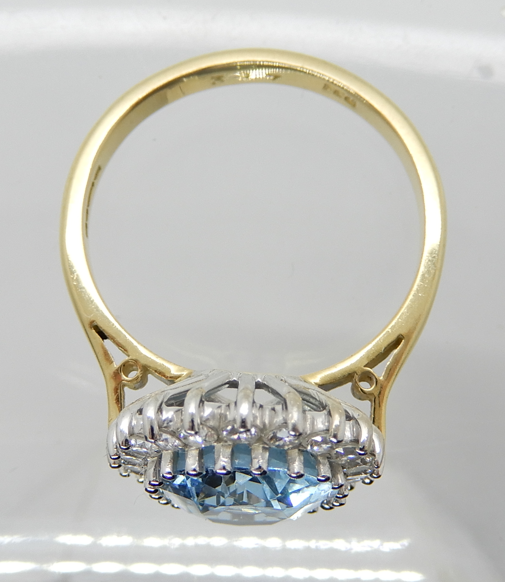 An 18ct gold aquamarine and diamond cluster ring dimensions of the aqua approx 11mm x 9mm x 5.4mm, - Image 2 of 3