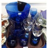A contemporary Bristol blue coloured lemonade jug and set of four matching tumblers, a pair of
