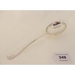 A silver serving spoon by Harrison Fisher & Company, Sheffield 1927, 21.5cm long, 98gms Condition