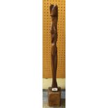 RENNI Elongated female form, carved wood, 68cm high Condition Report: Available upon request