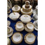 A Shelley dinner set, with white ground and gilt decoration, comprising; twelve dinner plates,