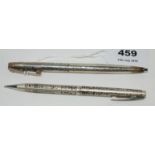 A Sterling silver cased pen and pencil set by Sheaffer Condition Report: Available upon request
