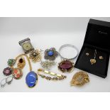 A silver and enamel Ortak, autumn leaf design pendant and earrings and a collection of costume