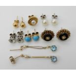 A collection of onyx pearl and yellow metal earrings and a collection of gold and yellow metal gem