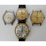 A Tissot wristwatch and three Tissot Seastar watch heads Condition Report: Not available for this