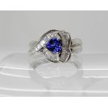 An 18ct white gold, blue and white sapphire ring, size O1/2, weight 5.2gms Condition Report: